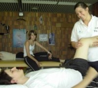 Woman receiving physiotherapy